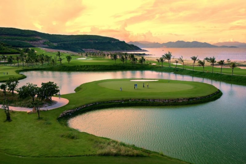 A golf course in Las Vegas over a lake.