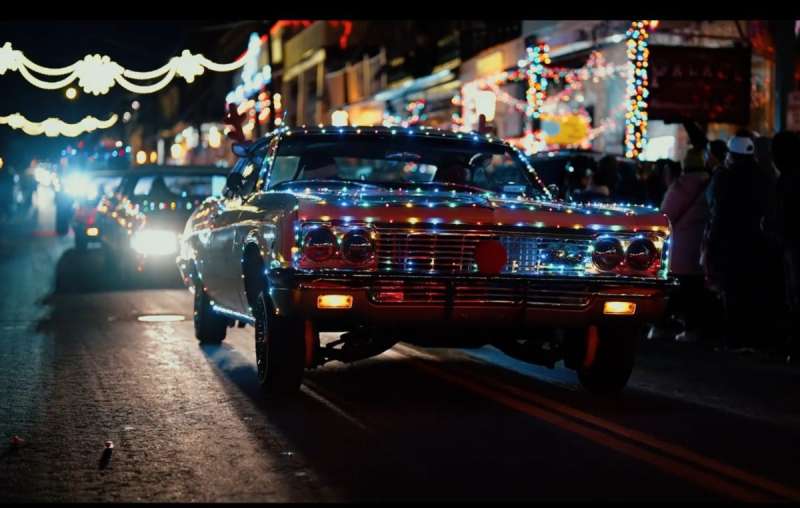 Line of cars driving though Virginia City.