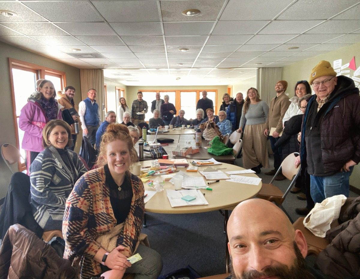 Selfie of members of the Groundswell Collective, as group of Walworth County, Wisconsin, residents who organized a successful campaign to expand Sunday transportation services, not just for errands or appointments, but to help people connect with each other and combat rural isolation.