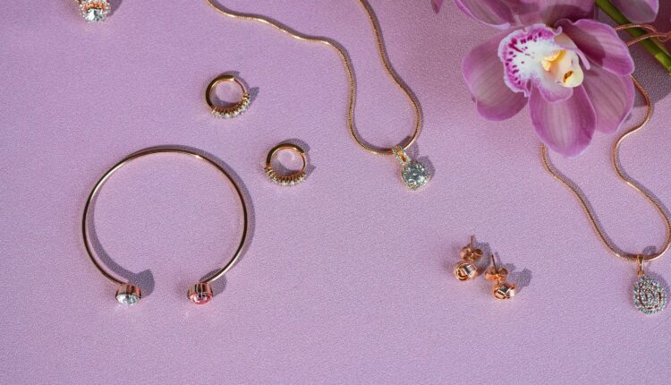 view of jewelry on a pink background