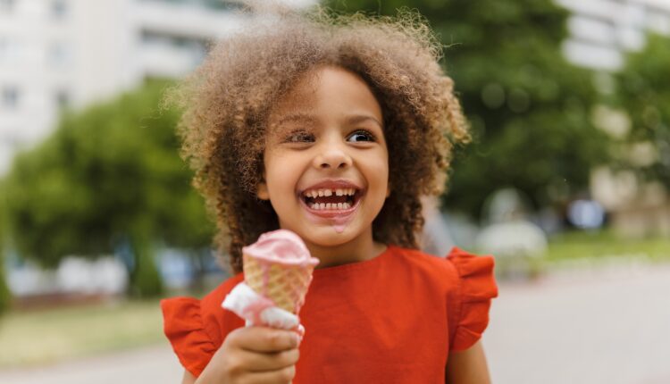 photo of child with ice cream cone