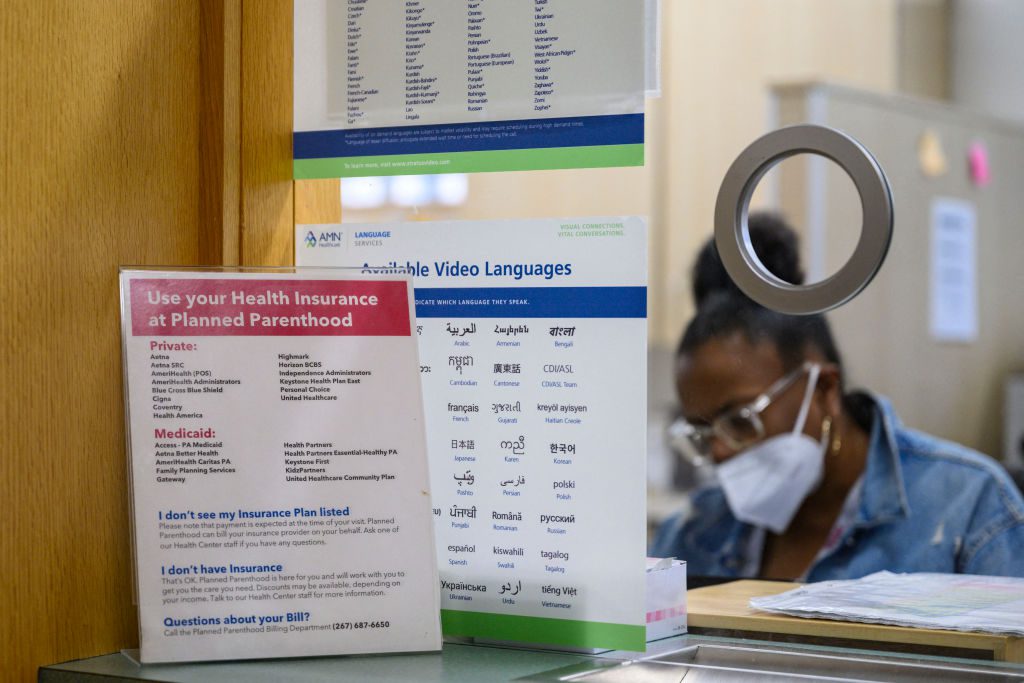 A receptionist works at a Planned Parenthood Health Center. (Angela Weiss/AFP via Getty Images)