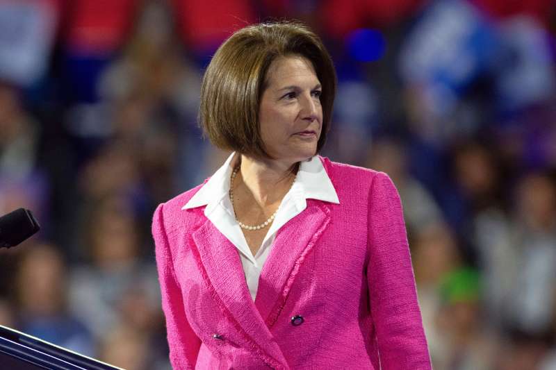 Sen. Catherine Cortez Masto in a pink suite at a rally.
